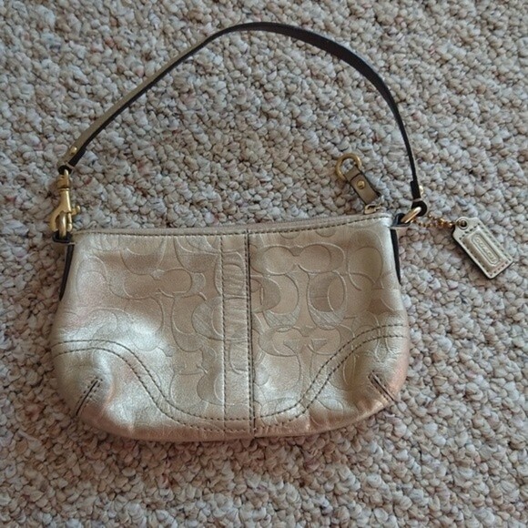COACH Small Sliver Metallic Embossed "C" Leather Wristlet Bag - Picture 1 of 10